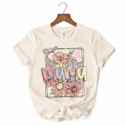Floral Mama Coquette Bow Pastel T-Shirt, White And Natural Boho Tee With Spring Flower -Eds Plant Shop floral mama coquette bow pastel t shirt white and natural boho tee with spring flower 848020